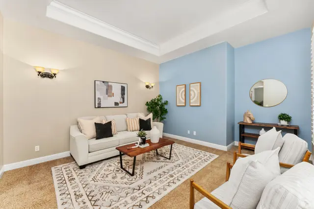 Formal living room with tray ceiling