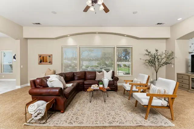 Family room seating area with large windows